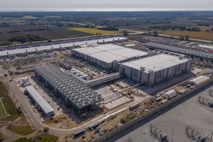 Aerial view of Microsoft’s AI data center construction site in Wisconsin, showing cooling infrastructure and large-scale buildings under development